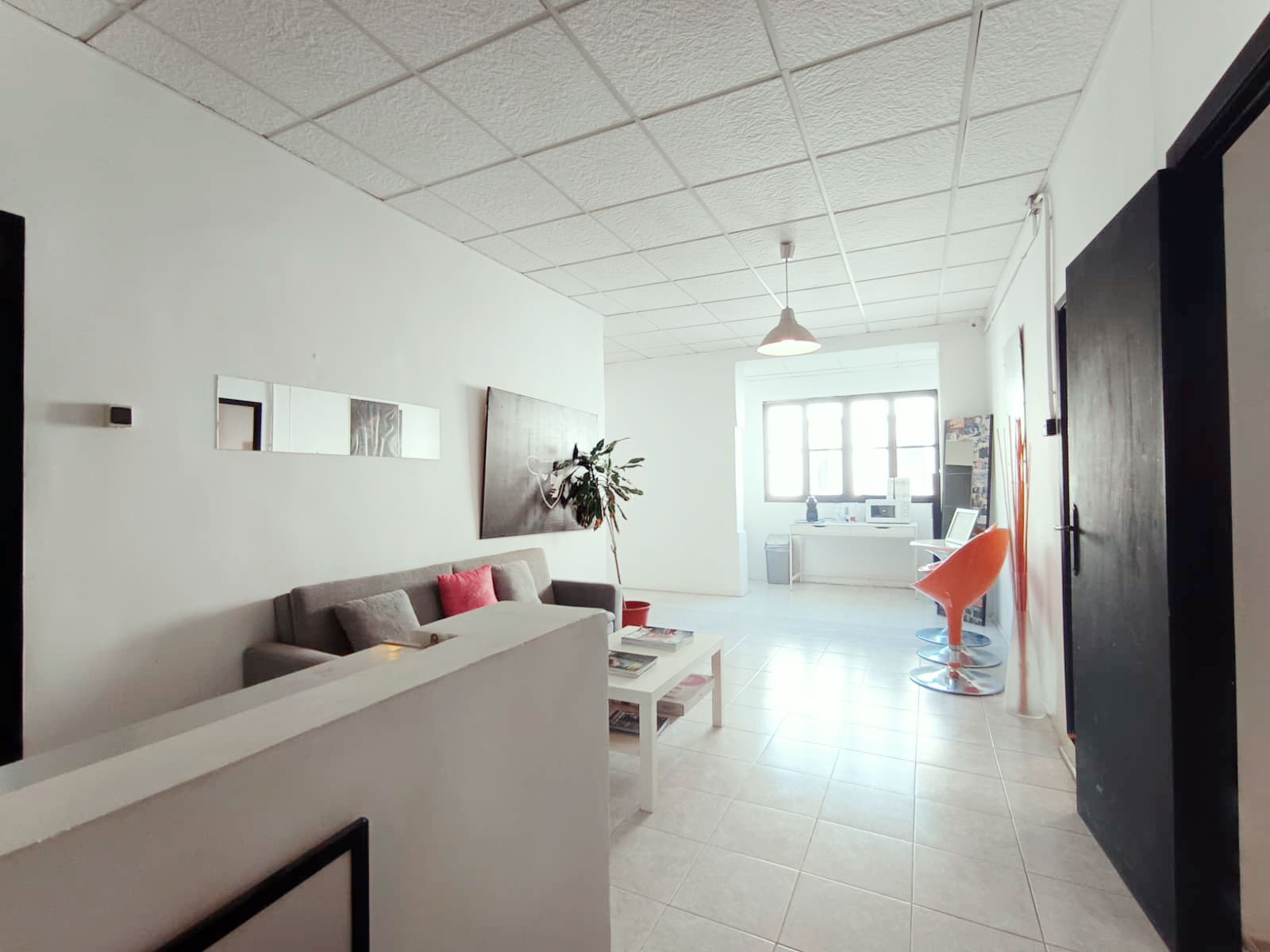 Production office workstation area at Murcia Production Service — desks and high-speed WiFi